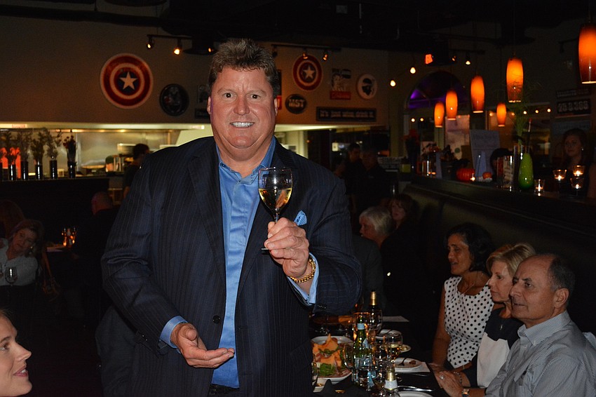 Ernie Garcia of The Ernie Garcia Group at Morgan Stanley, the event's main sponsor, enjoys a laugh during Dick and Lorraine Vitale's pediatric cancer fundraiser on Tuesday at Main Street Trattoria.
