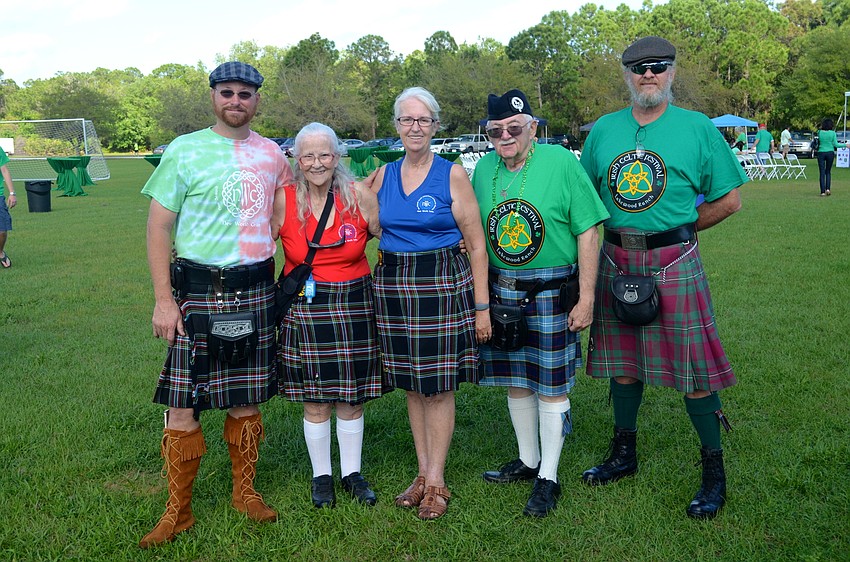 Todd MacClinchy, Gillian and Sandra Conlen, Bob Greene and Mike Greer show off their kilts as symbols of their heritage.