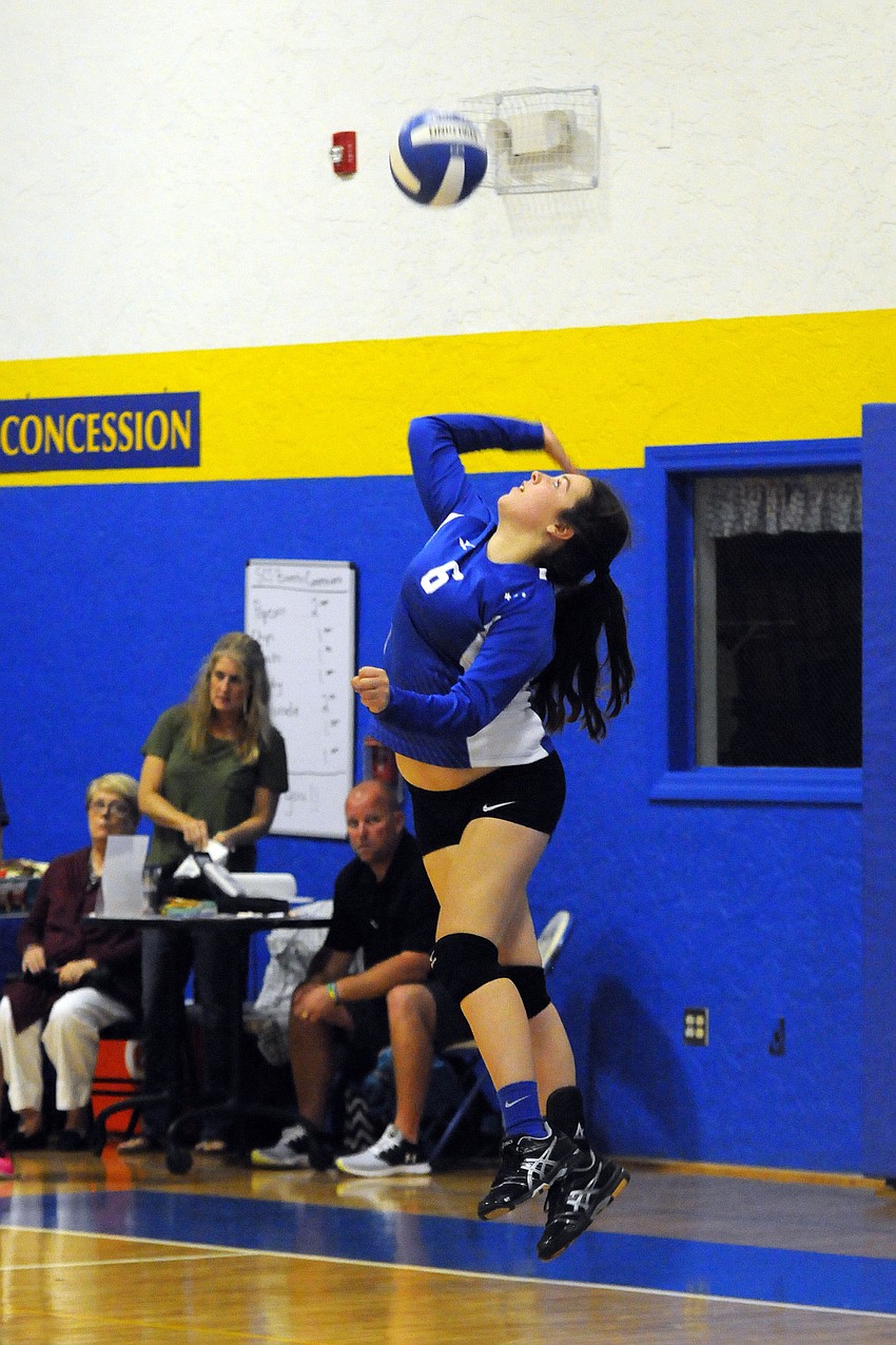 Sarasota Christian sophomore Brooke Wagler serves the ball in the second set.