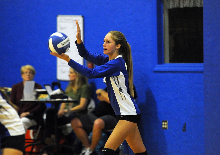 Jeslyn O'Shea prepares to serve the ball for Sarasota Christian.