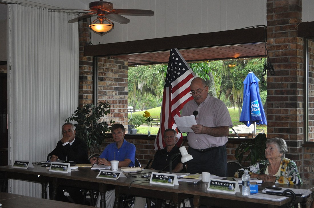 Dan Smith, chairman of the Bobby Jones Golf Course Study Committee, addresses the crowd at a town hall meeting Oct. 8.