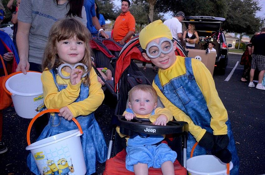 Isabella, Savannah and Matthew Horton love Minions.