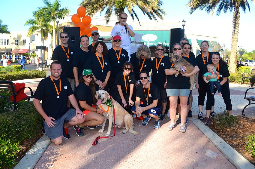 The Berlin Packaging team poses for a group photo after the walk.