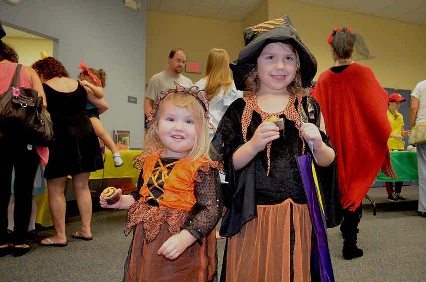 Samantha and Caitlin Encke, of Bradenton, bewitch the crowd.