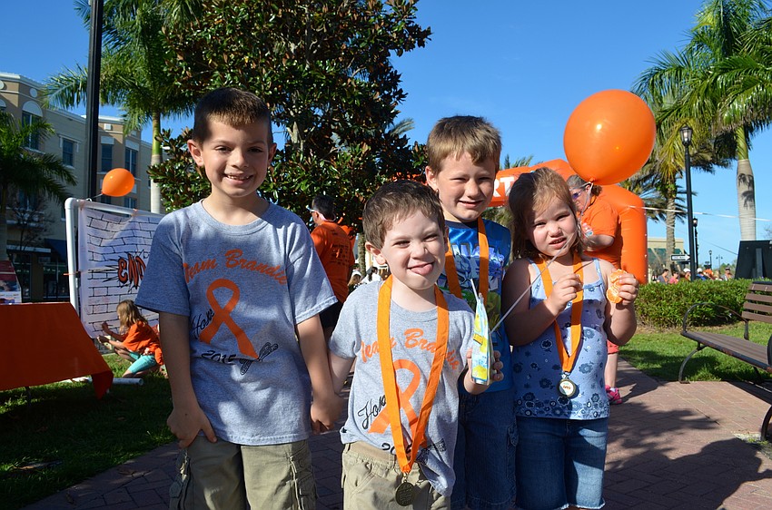 Carsen Smalley, Levi and Allyson Lange and Colten Grolemund are some of the youngest walk participants.