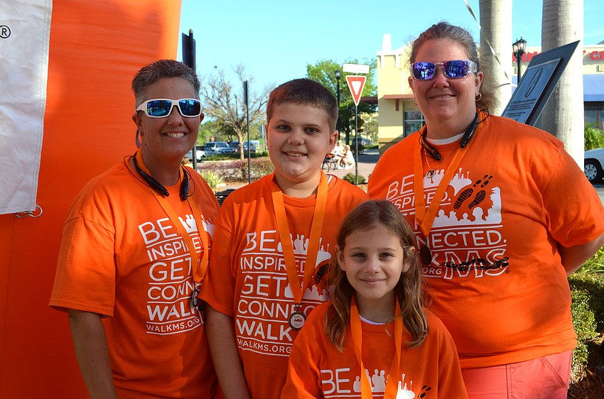 Nadine Sweeten walks in the event with her friends, Sebastian, Margaret and Heather Fassett.
