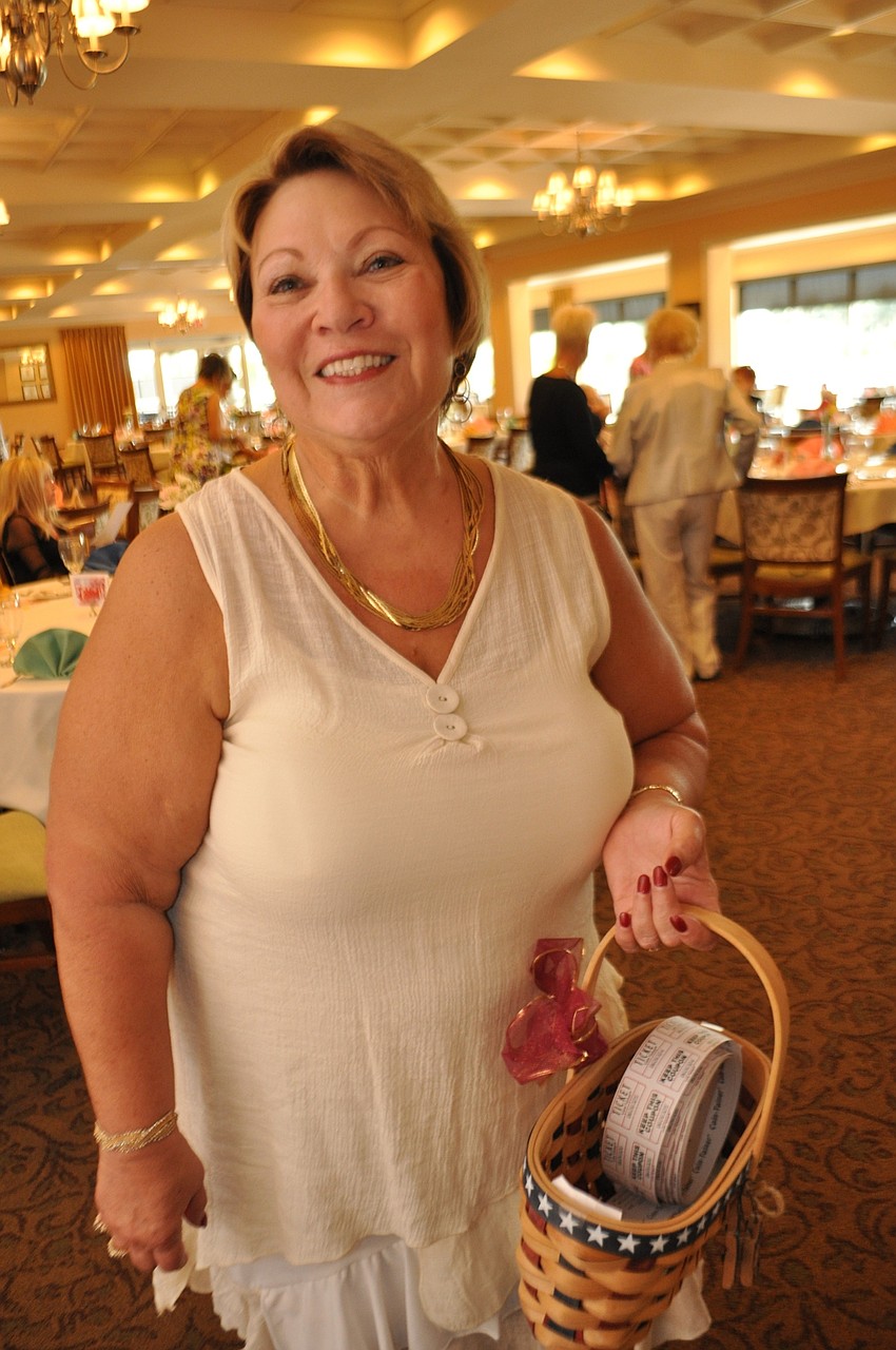 Pat Babcock sells 50/50 tickets.