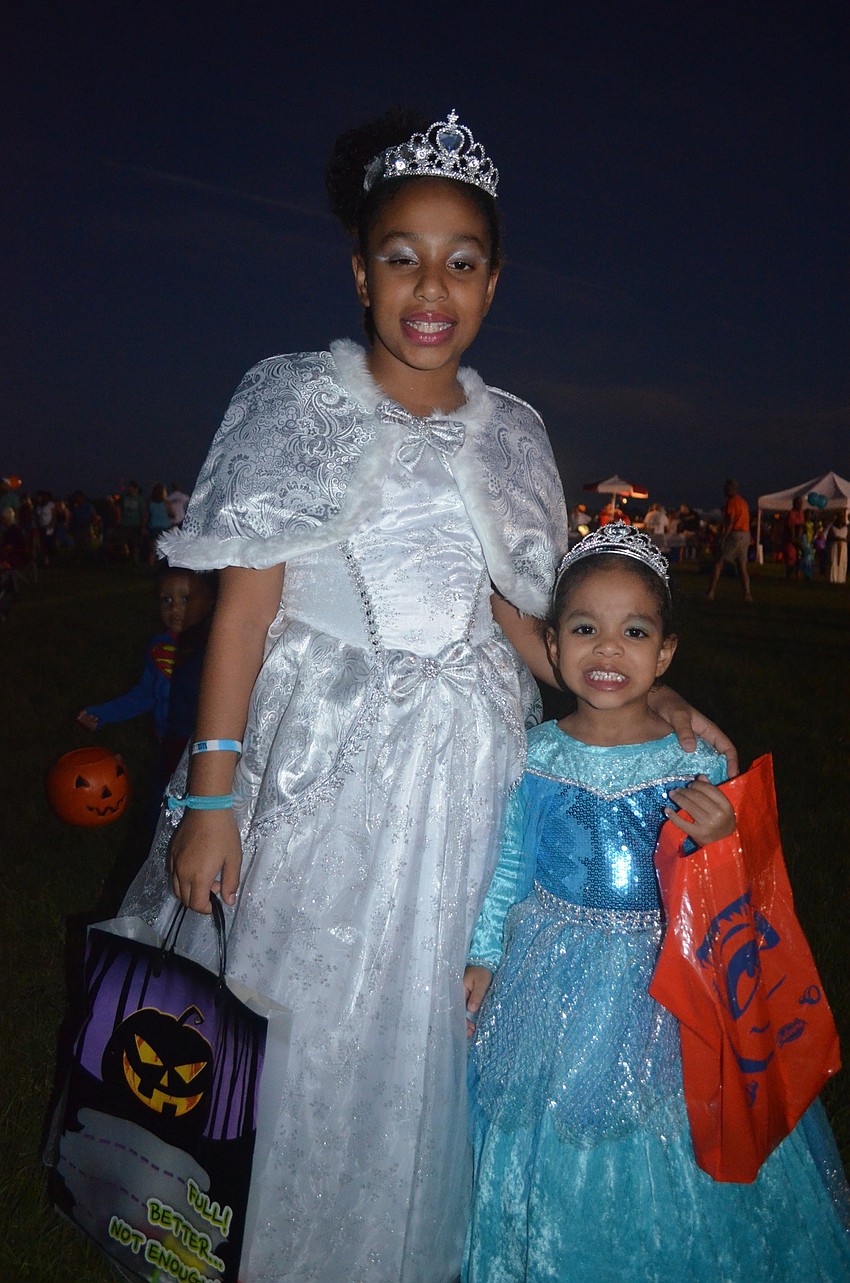 Nicole and Natalia Peno, of Lakewood Ranch, show off their ball gowns.
