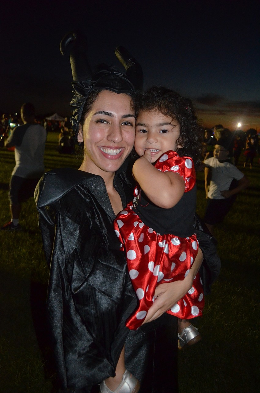 Sadaf Haider and her daughter, Lena, of Lakewood Ranch, play Maleficent and Minnie Mouse.