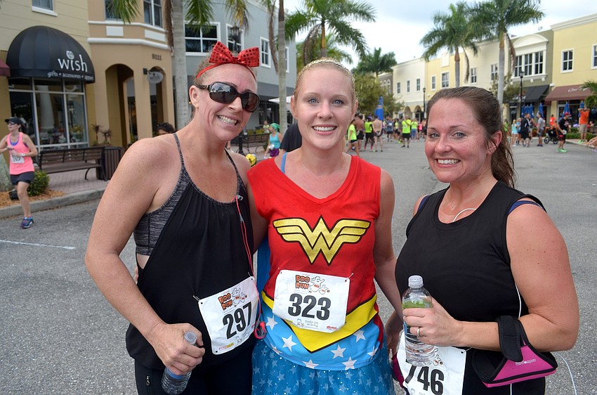 Angie Hynes, Kari Schroeter and Liz Pope, of Sarasota, dress for the occasion.