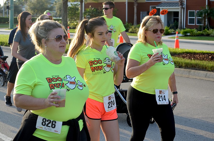 Sherry and Katie Kelly enjoy cold drinks alongside Linda Nicks.