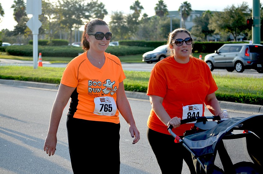 Christine Greene, of Bradenton, and Marissa Carlson, of Sarasota, enjoy a morning workout.