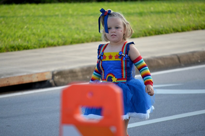 Four-year-old Savannah Jones, of Lakewood Ranch, shows off her Halloween outfit during the event.
