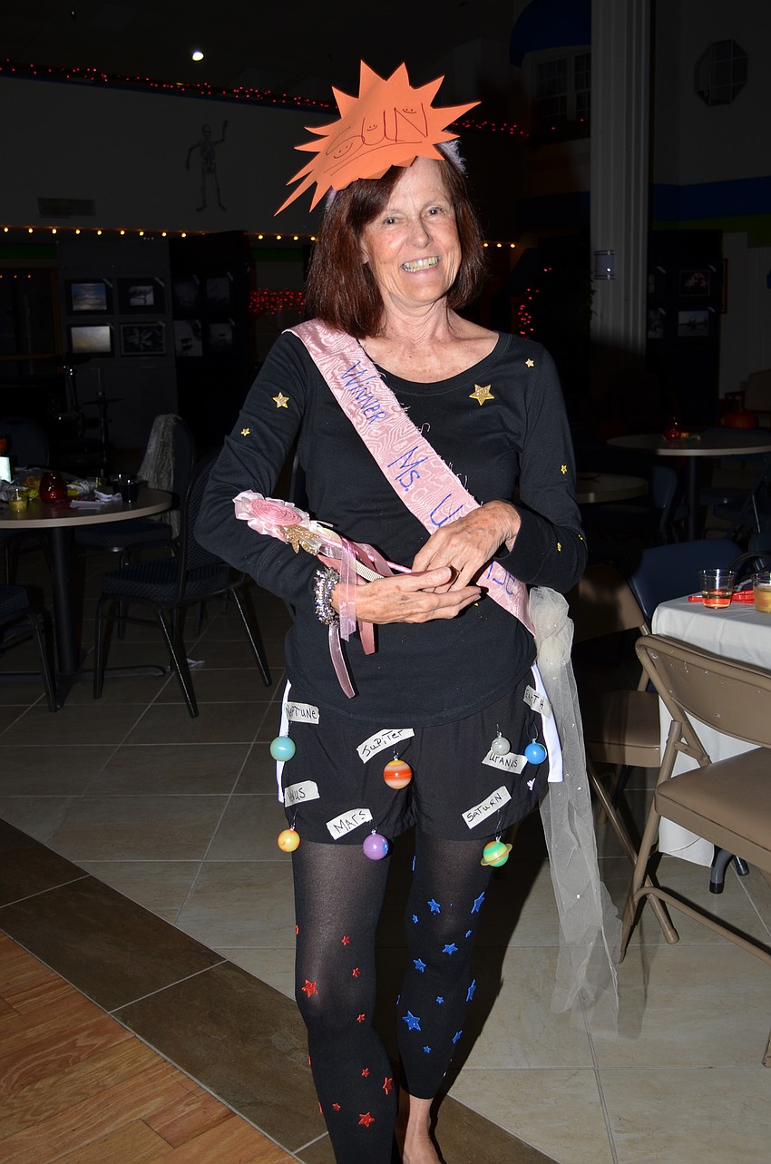 Maggie Minehardt dressed as Miss Universe.