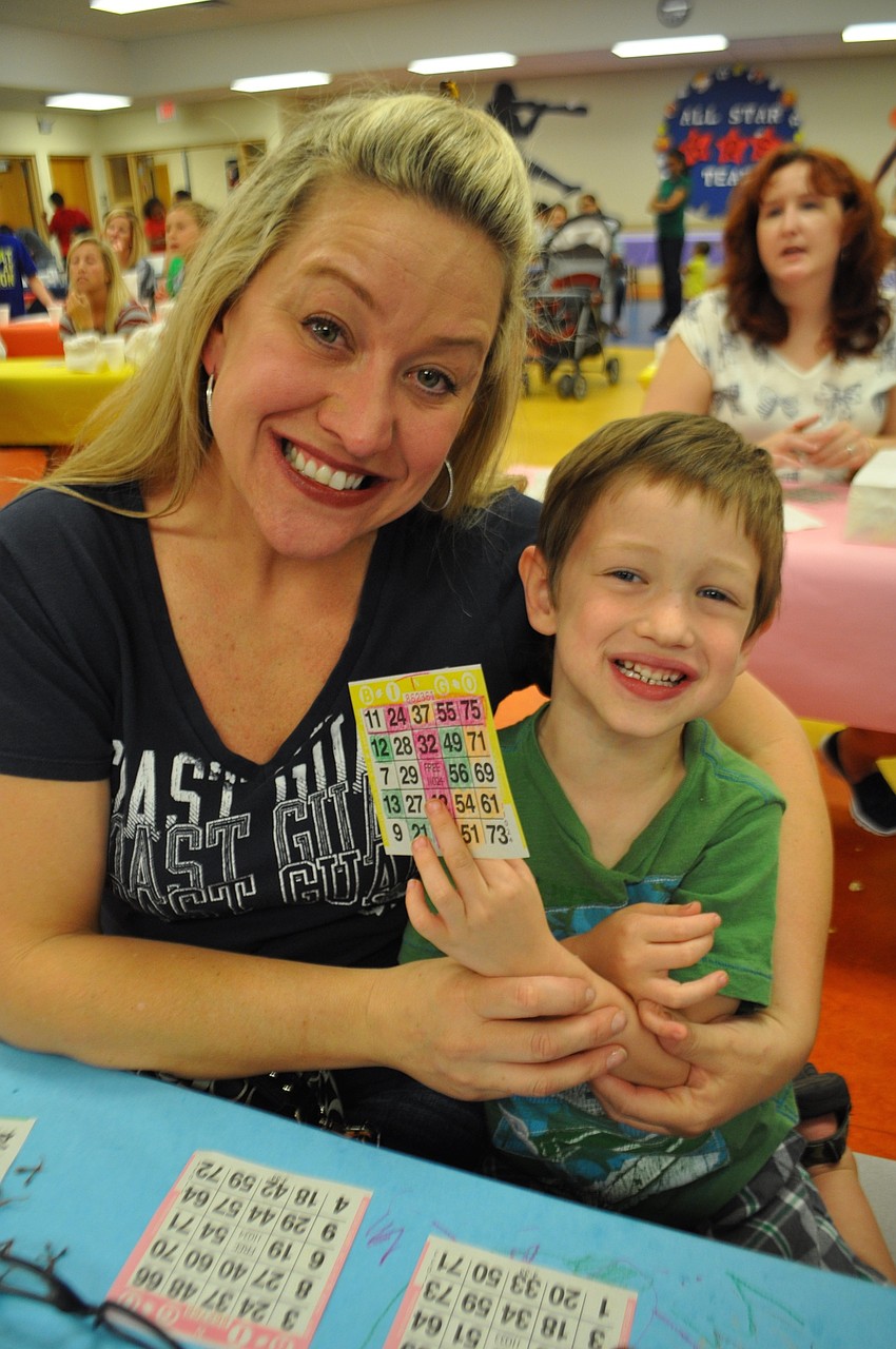 Stacie and Brent Workman show off their bingo card.