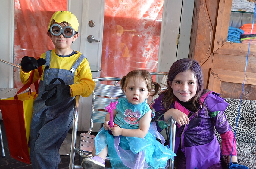 Siblings Timothy, Lily and Alexandra O'Connell stop in at LeLu's Coffee Lounge.