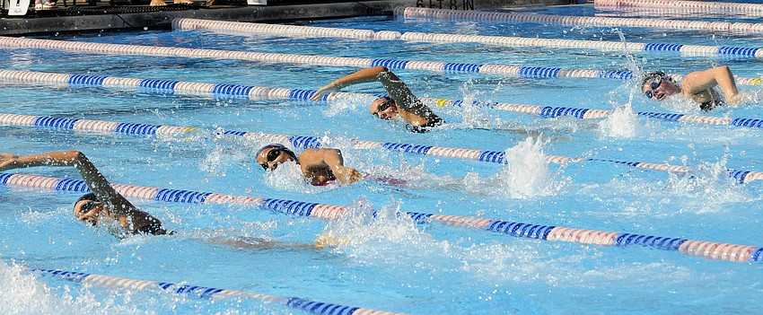 Sarasota's Elizabeth Voronina, Palm Harbor University's Stephanie Hernandez, Sarasota's Olivia Graham and Riverview's Rachel O'Grady compete in the third heat of the 200-yard freestyle.