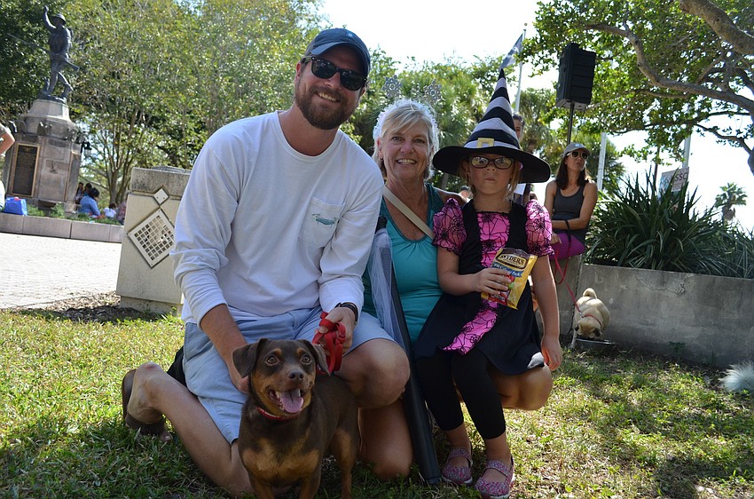 Brad Benson, Patty Benson, Addyson Kotlarczyk with Duke.