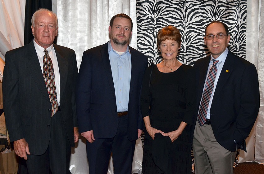 George Pacharis, John Snook, Dottie Pacharis and Brandon Staglin