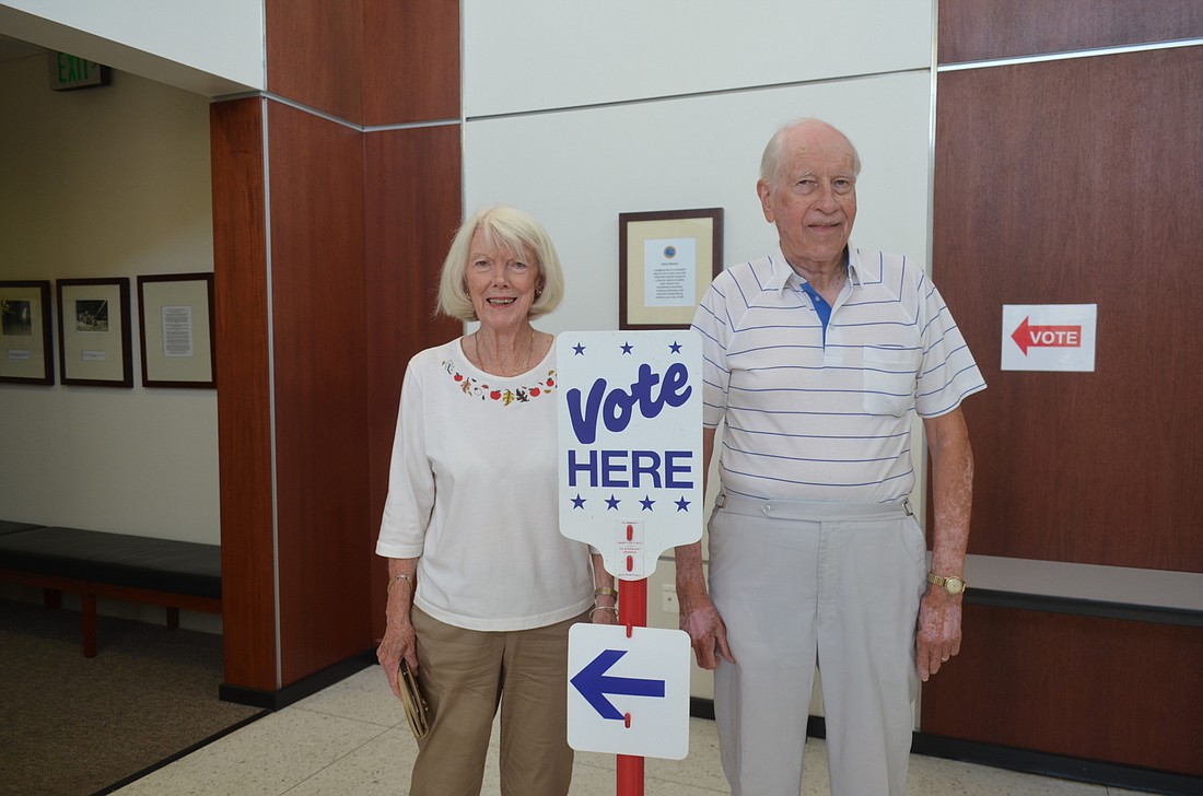 Mary Dee and Don Klingenberg vote Tuesday at Longboat Key Town Hall.