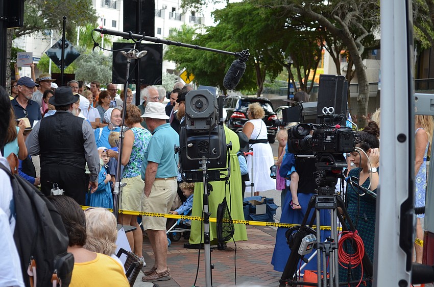 Dozens of news networks and media companies lined the street in front of BookStore1Sarasota today, in anticipation of the arrival of Ben Carson.