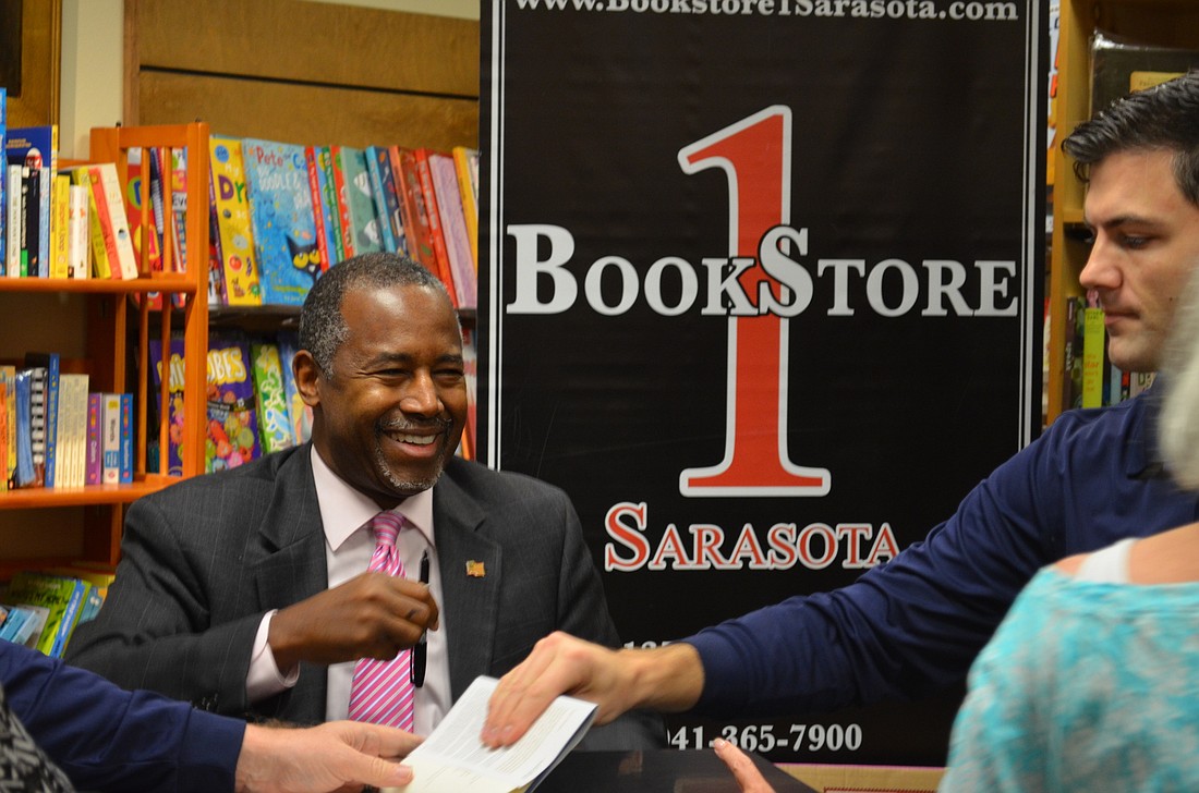 Republican presidential candidate Ben Carson signed hundreds of books Wednesday, at BookStore1Sarasota.
