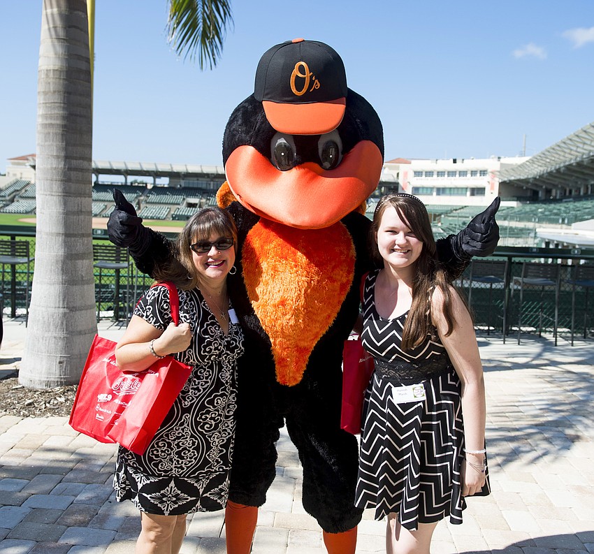 Kelly Marsh, the Orioles Bird and Hannah Marsh