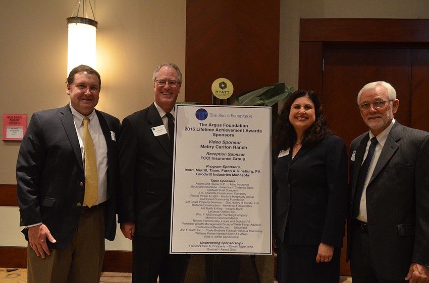 Argus Foundation board members Keith Mercier and Joel Scheichler with Executive Director Christine Robinson and President Joe Hembree