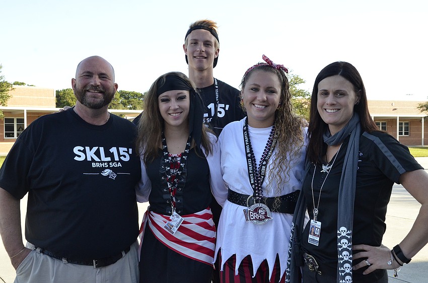 Assistant Principal John French, far left, and Principal Jenni Gilray, far right, supported the student government association in its homecoming events. French and Gilray pose with SGA students Lauren Kvederis, Blake Middleton, president, and Ceara Millas