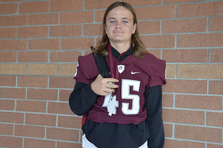 William Thompson wore a Braden River jersey to support his school Friday.