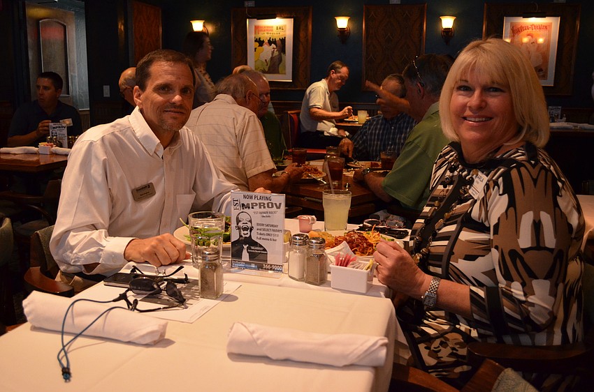 Rick Hughes and Sarasota Kiwanis Club Vice President Marla Doss.