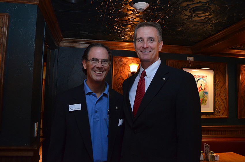 Sarasota Kiwanis Club President Terry McGannon and Pete Abbott.
