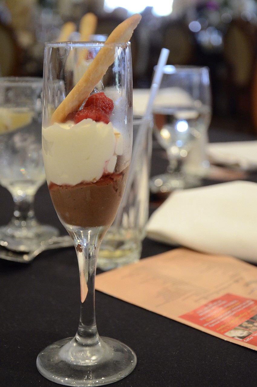 Palm-Aire Women's Club members enjoyed a meal at the Palm-Aire Country Club and watched the fashion show through dessert.