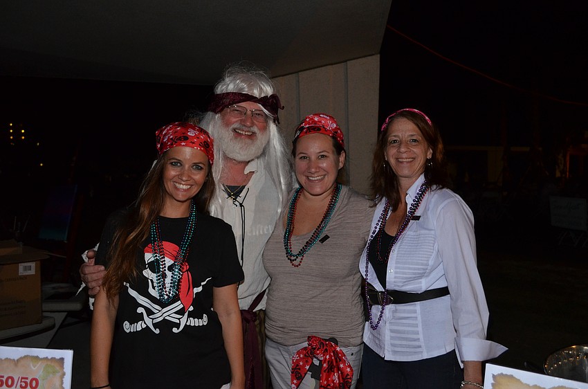Siesta Key Chamber of Membership Services Manager Desiree Hanright, Bob Kirscher, Events Manager Shawna Frank and Visitor Center and Volunteer Manager Mia Leone.