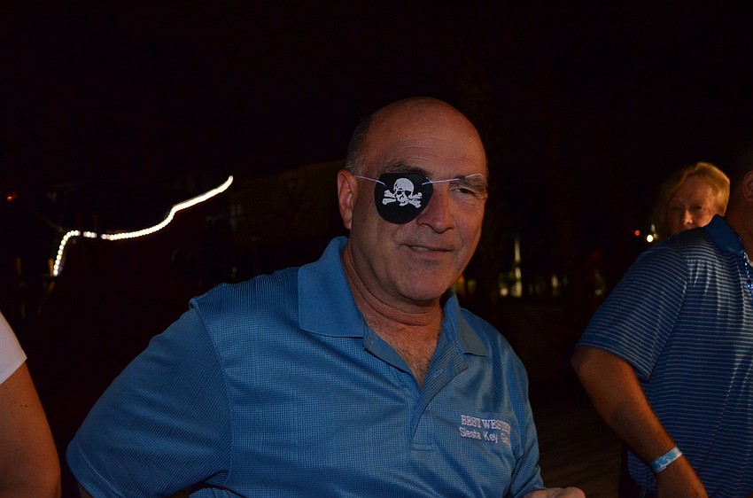 Ed Bankemper tries on an eye patch.