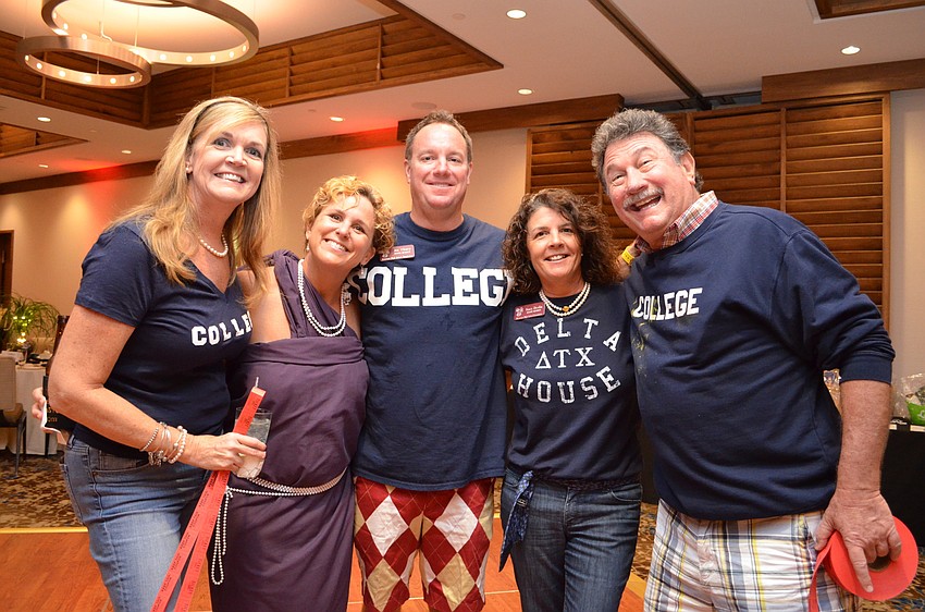 Board members Jeanne Armour, Missy and Joe Cleary, Event Co-Chair Stacy Devlin and Steve Martin.