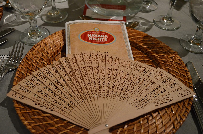 The decor for the evening included traditional wooden fans.