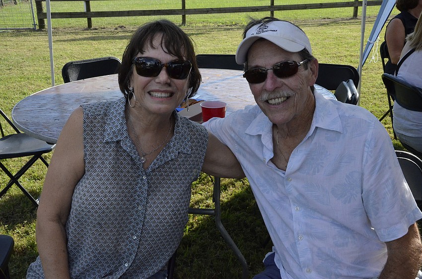 Linda West and Chip Wood of Bradenton came to support the fundraiser. They bring their dog to Heiki Caspry's doggy daycare.