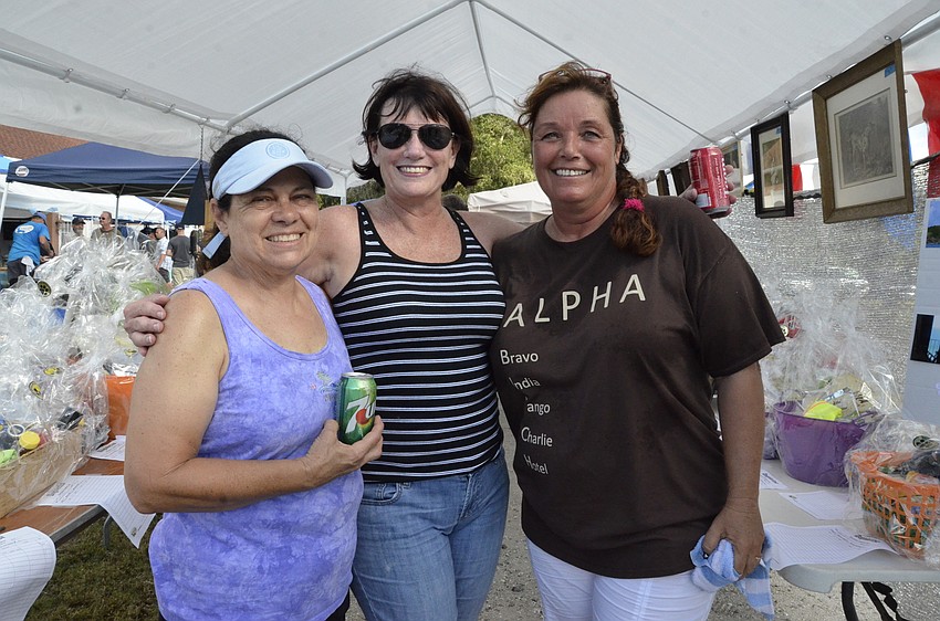 Val Clows, board member, Vikki Egan, president, and Heiki Caspry, events coordinator.