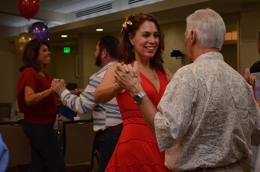 Marni Mount dances with her father Steve Altaker.
