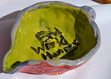 Handmade clay bowls were crafted by students at Sarasota County Schools and local artists.