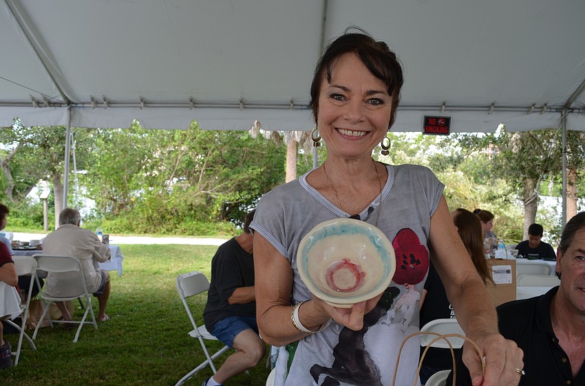 Dolly Jacobs shows off the bowl she picked out.
