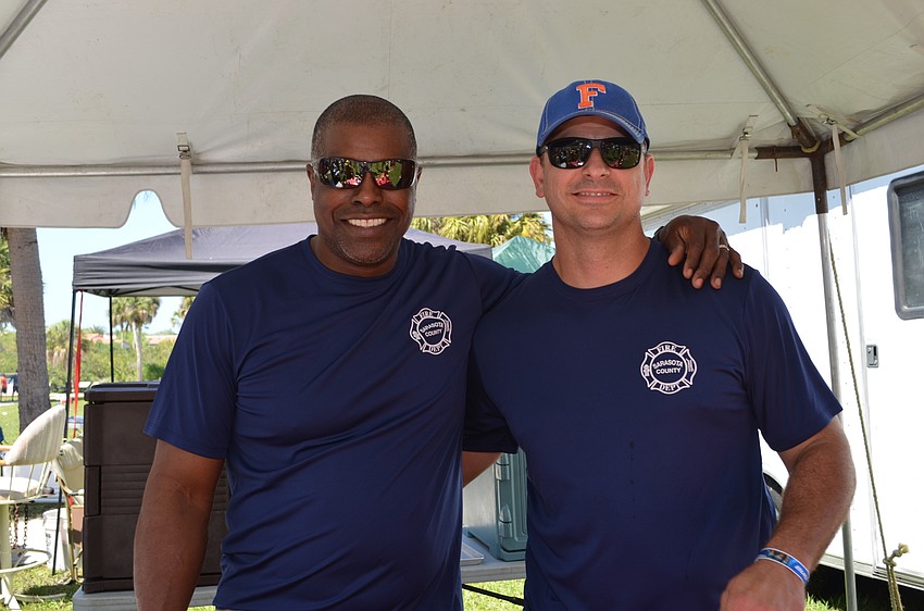 Sarasota County firefighters and members of the 2014 Rib Cook Off winning team, Bob Williams and Bobby Rissler.