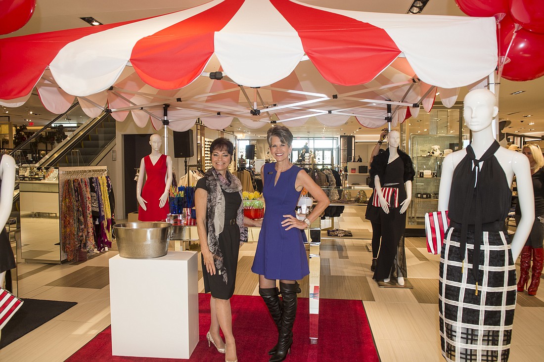 Circus Arts Conservatory Co-Founder Dolly Jacobs and Saks Fifth Avenue Marketing Director Sally Schule under the big top Saks created for the event.