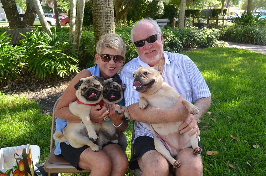 Sherry and Gary Moore with Tucker and Cooper, 6 months, and Kona, 7