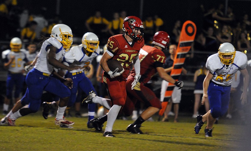Running back Vinny Conetta scored Cardinal Mooney's only touchdown on a 2-yard run.