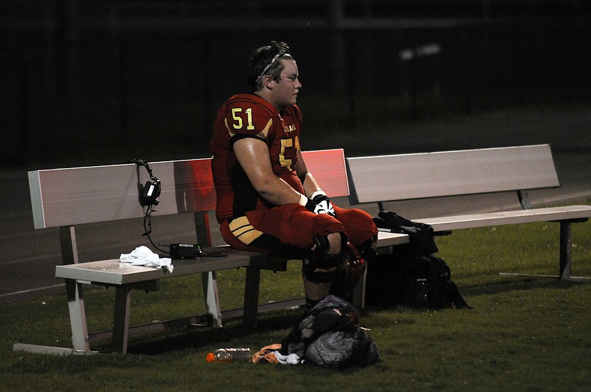 Senior linman Kyle Novak gets a breather in the first half.