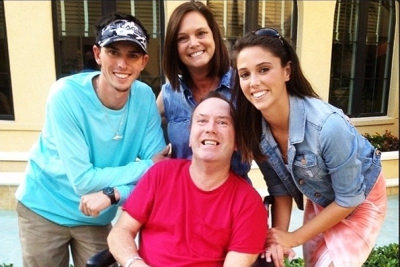 The Adams family is raising dollars for Scott Adams' (center) medical needs.