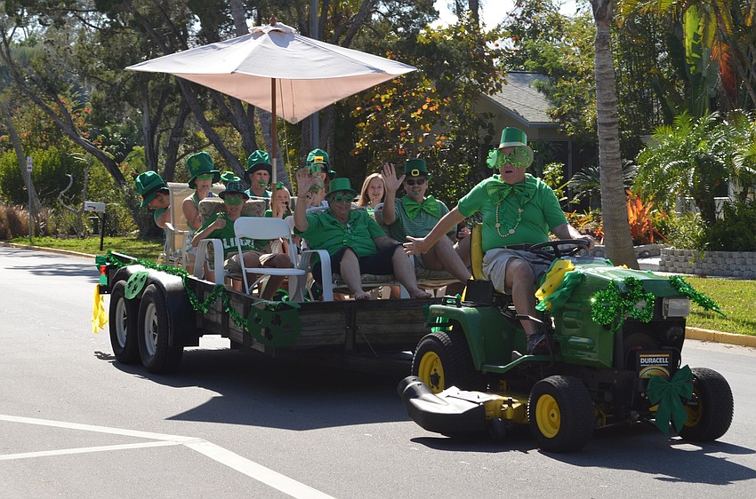 Craig Meldahl towed friends and family on a lawn mower during the parade.