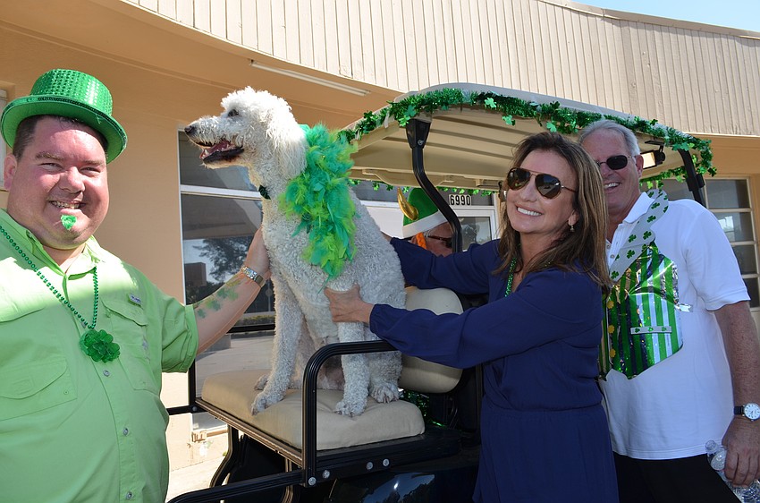 Jeff Carman, Gnarly, Lucille Miller and Michael Drake before the start of the parade.